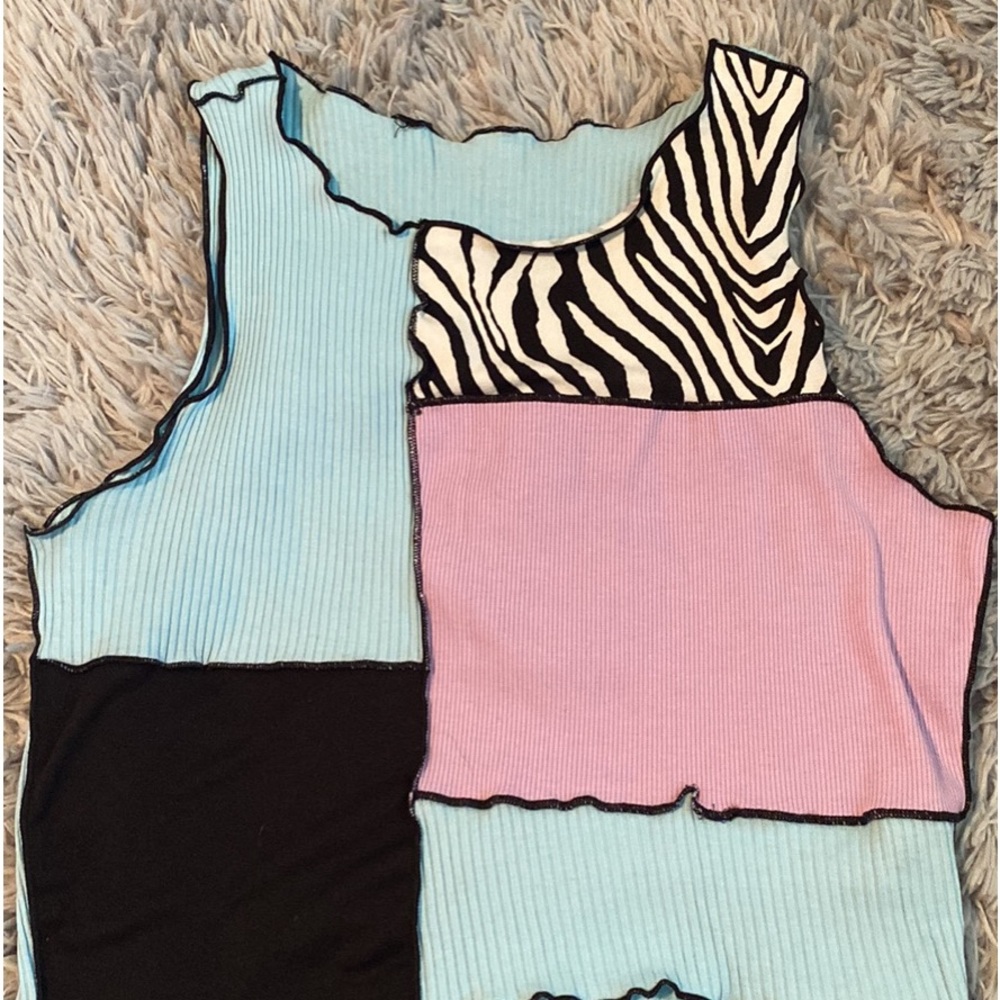 This top is super cute and it has multiple colors and designs.